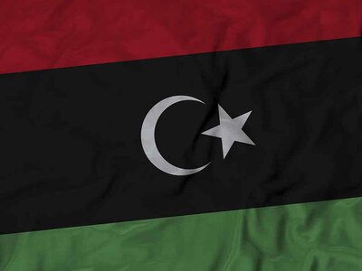 Nahaufnahme der gekräuselten Libyen Flagge, Stoff gekräuselt Flagge Hintergrund